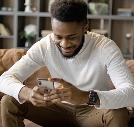 man texting in a phone